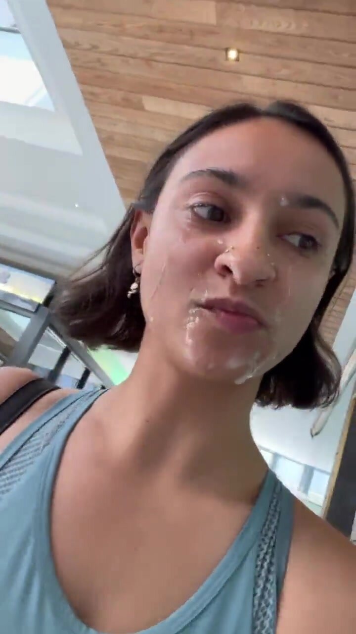 Young woman walks through mall with cum on her face pic