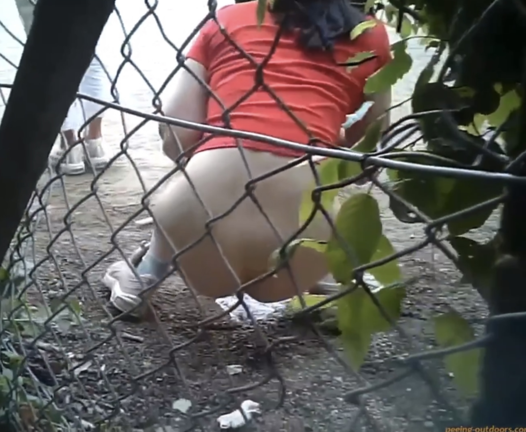 Two girls take a desperate pee outdoors (voyeur) image