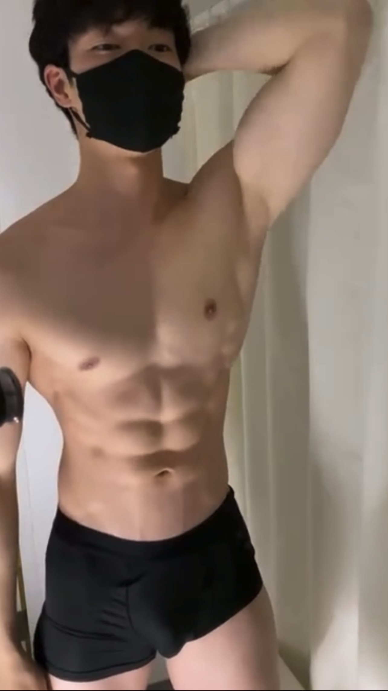 Cute asian guy shows off muscle - ThisVid.com