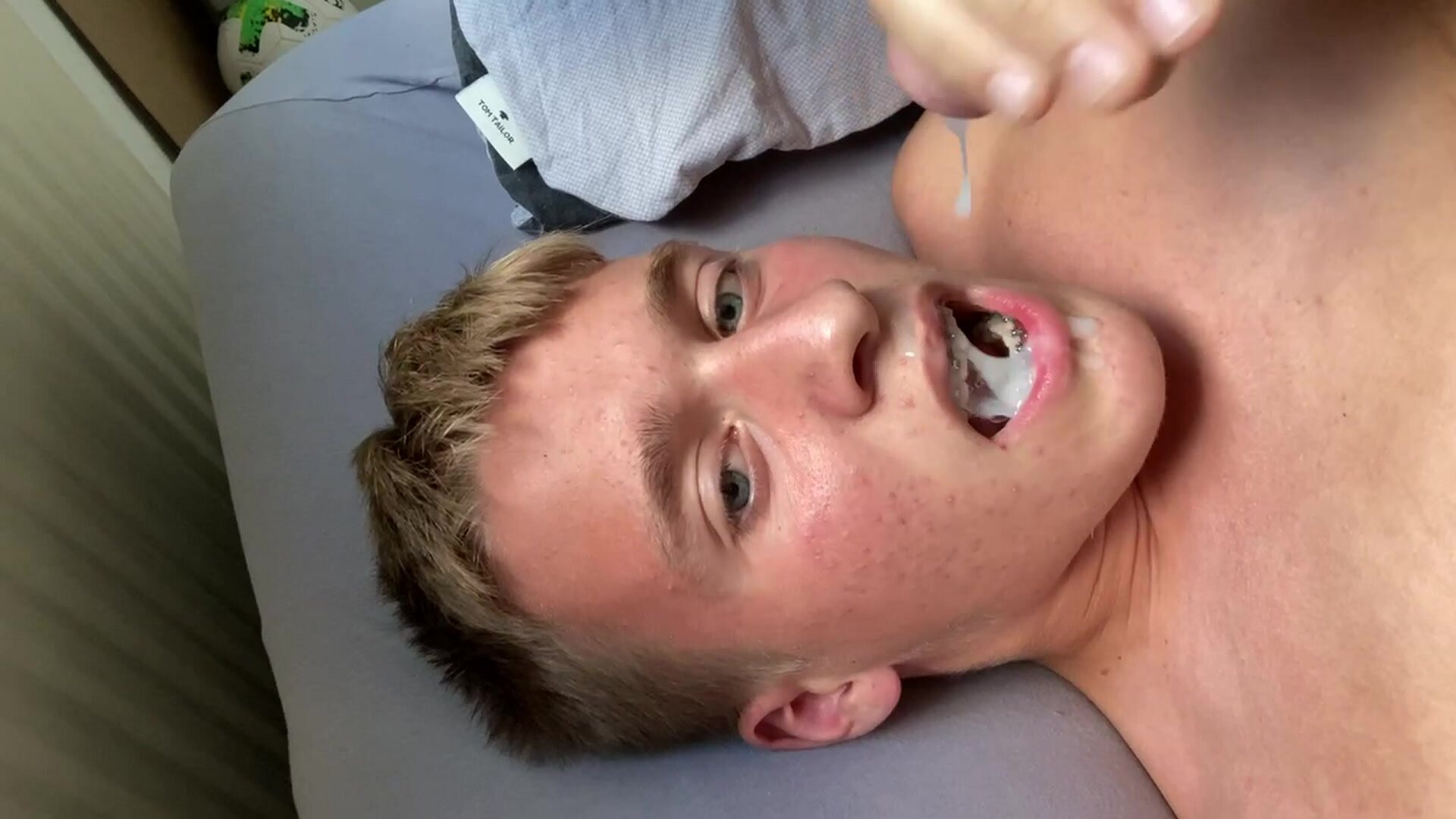 Braces guy cumming on own face and in own mouth - video 2