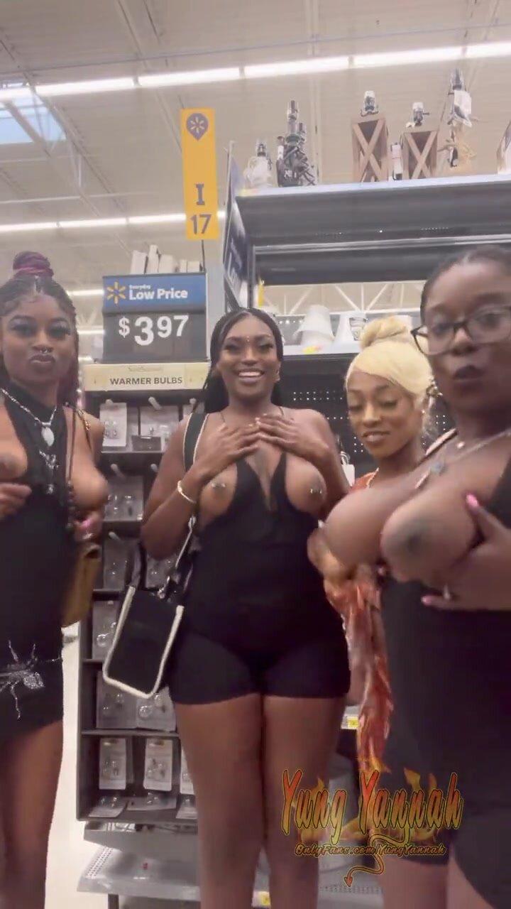 Group of ebonies get caught flashing tits n Wal-Mart picture pic