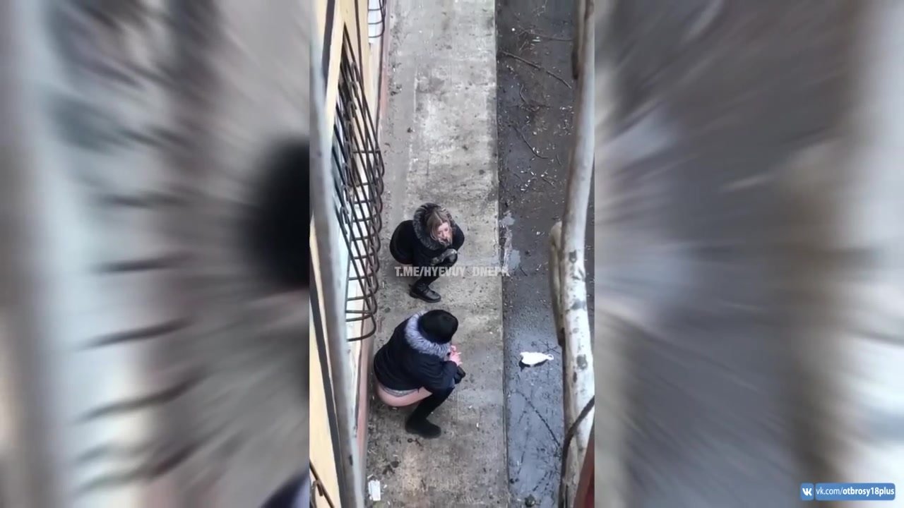 Two ukrainian girls pee outdoor