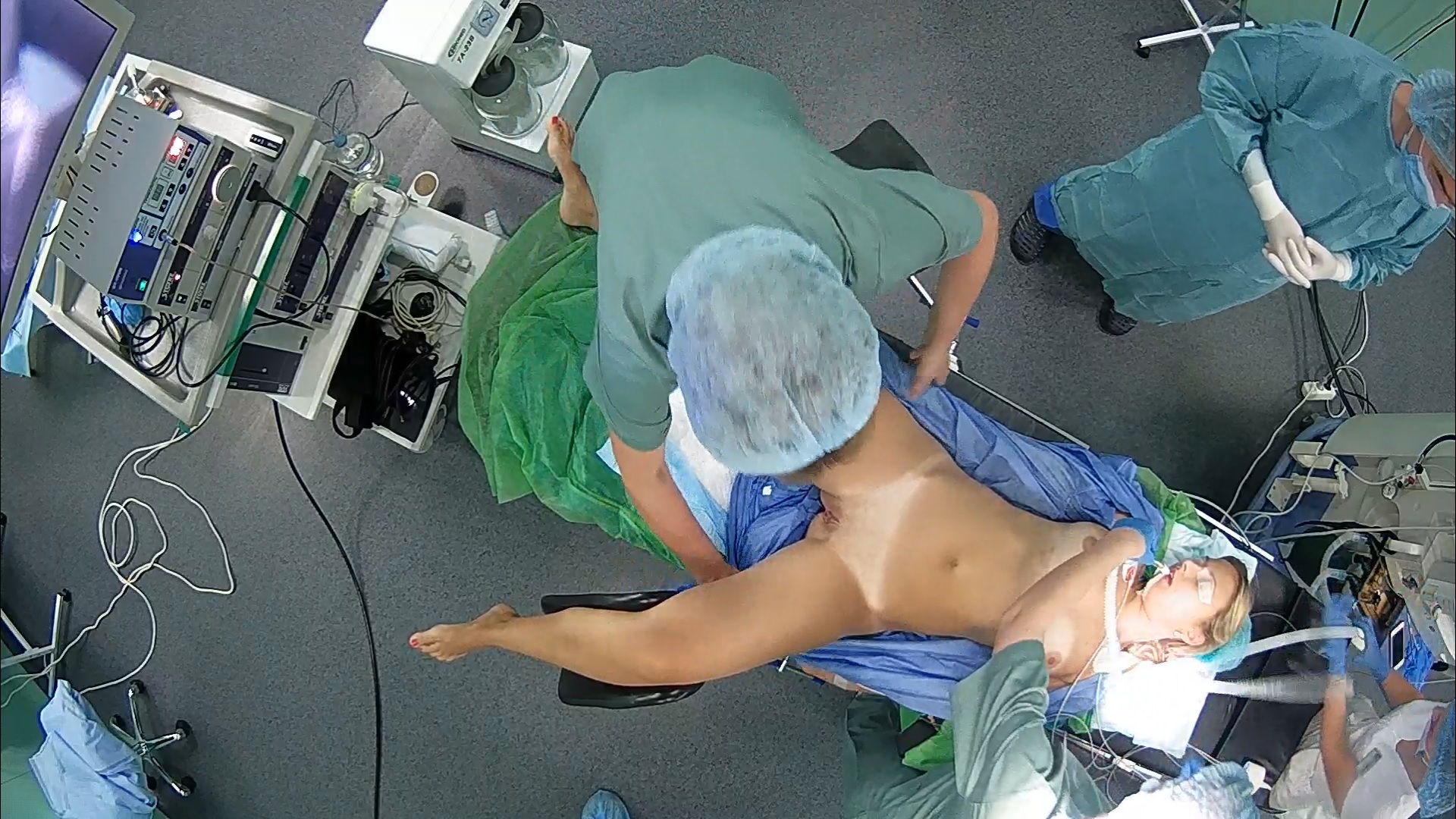 Young woman being prepared for surgery - ThisVid.com