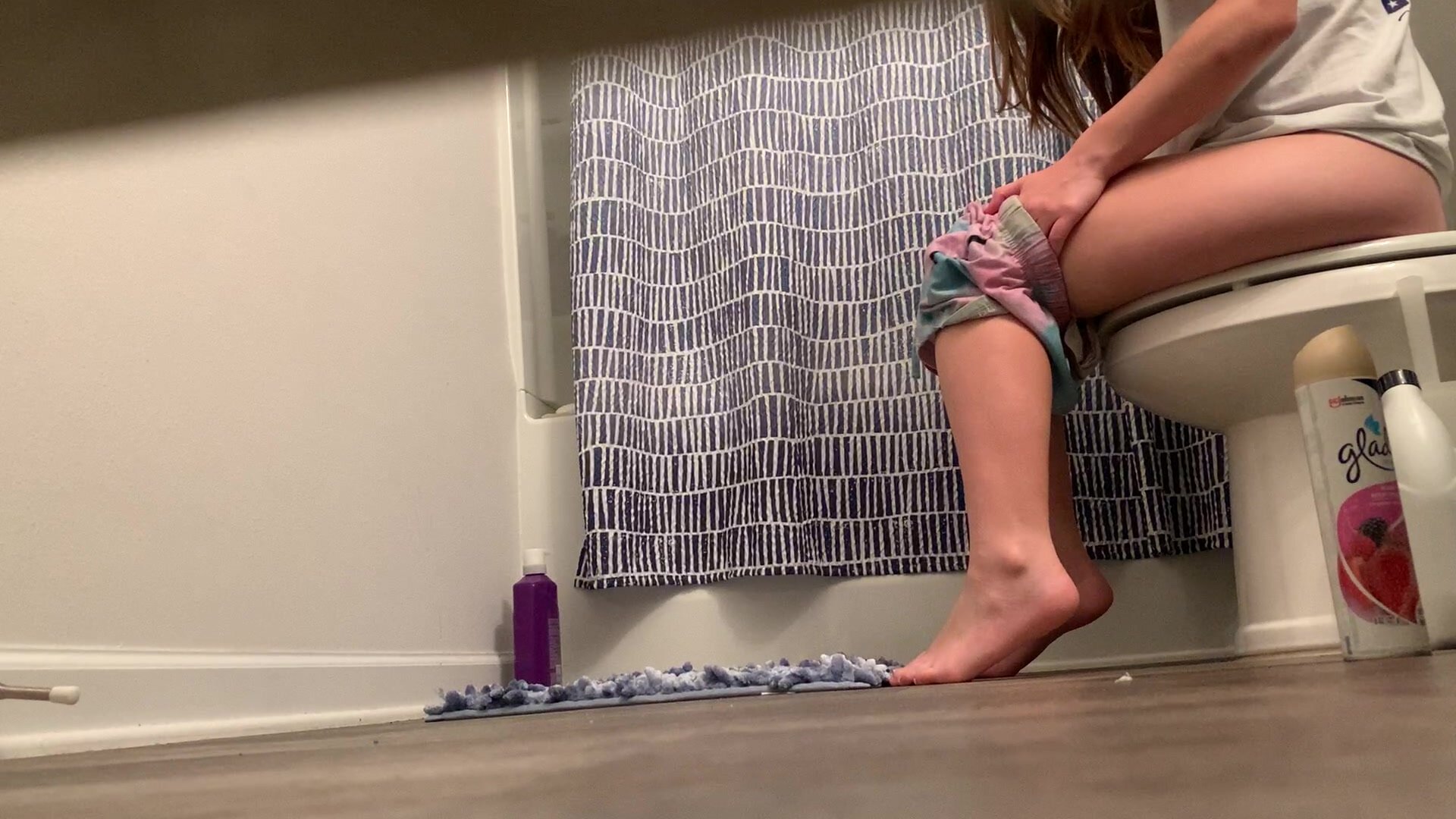Underdoor voyeur of another sister friend peeing photo