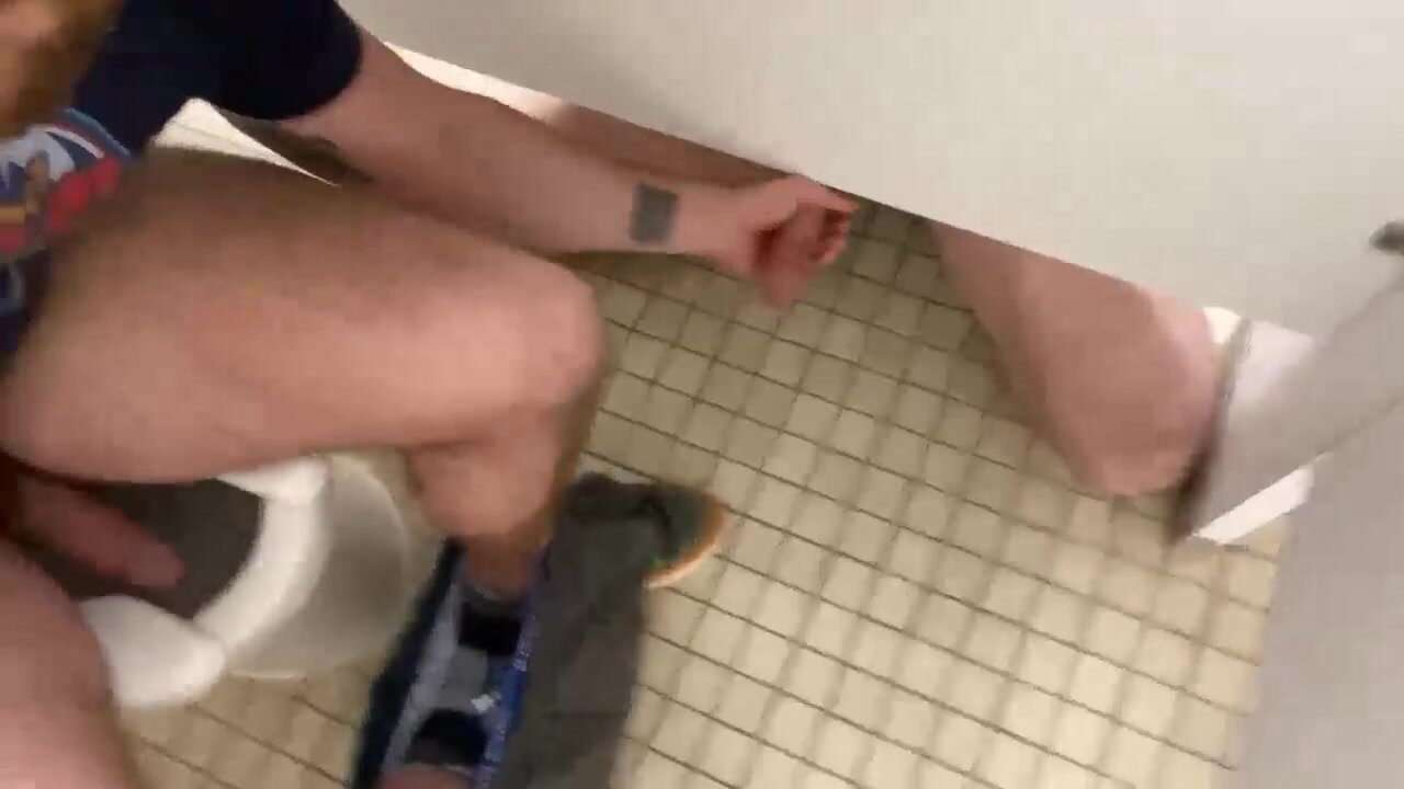 Giving a handjob understall bathroom cruising - ThisVid.com