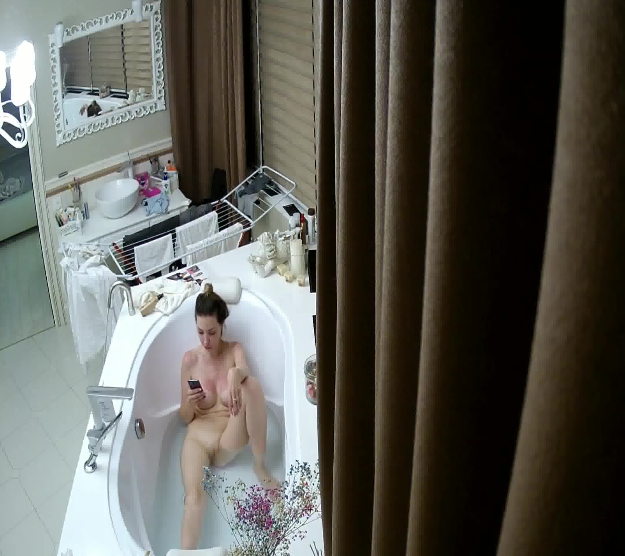 Hot girl taking a bath on hidden camera 1