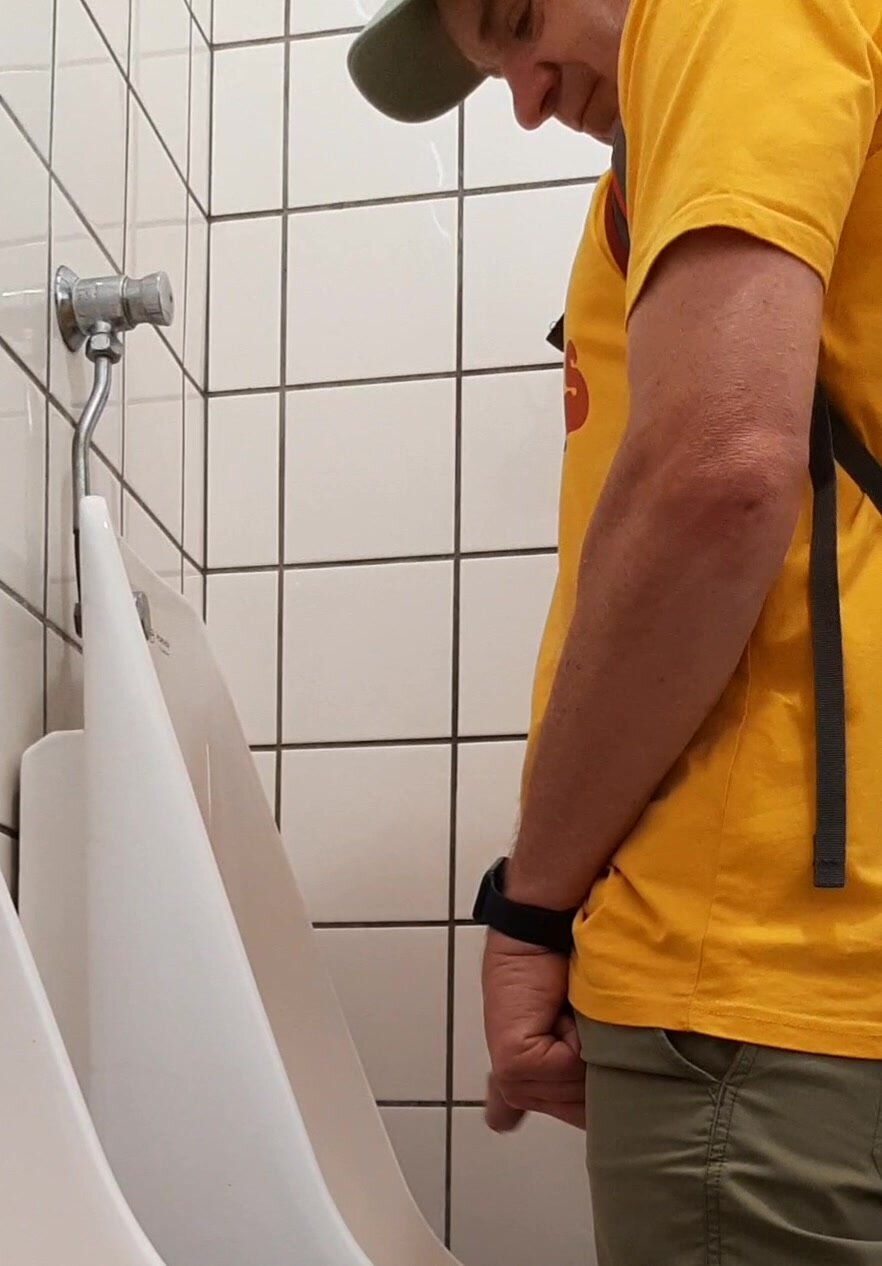 Spy a cock at urinal - ThisVid.com