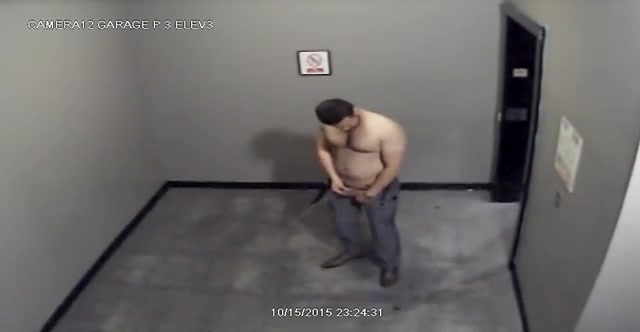 Man urinating in elevator lobby - ThisVid.com