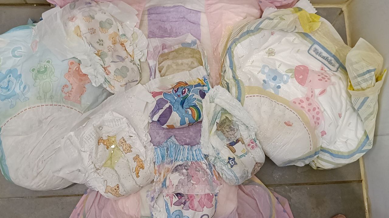 Pissing over last weeks diapers photo photo