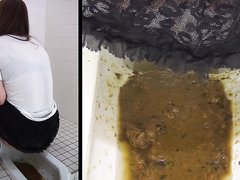 2 Japanese girls diarrhea in floor toilet.