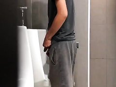 SPYING MEN PISSING AT URINAL 2