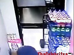 Black girl pissing inside store