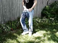 PIssing in jeans in the garden