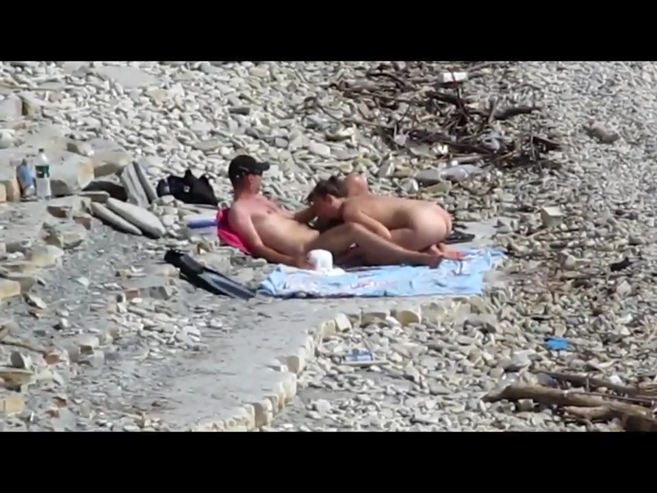 Horny couple fucking at the beach