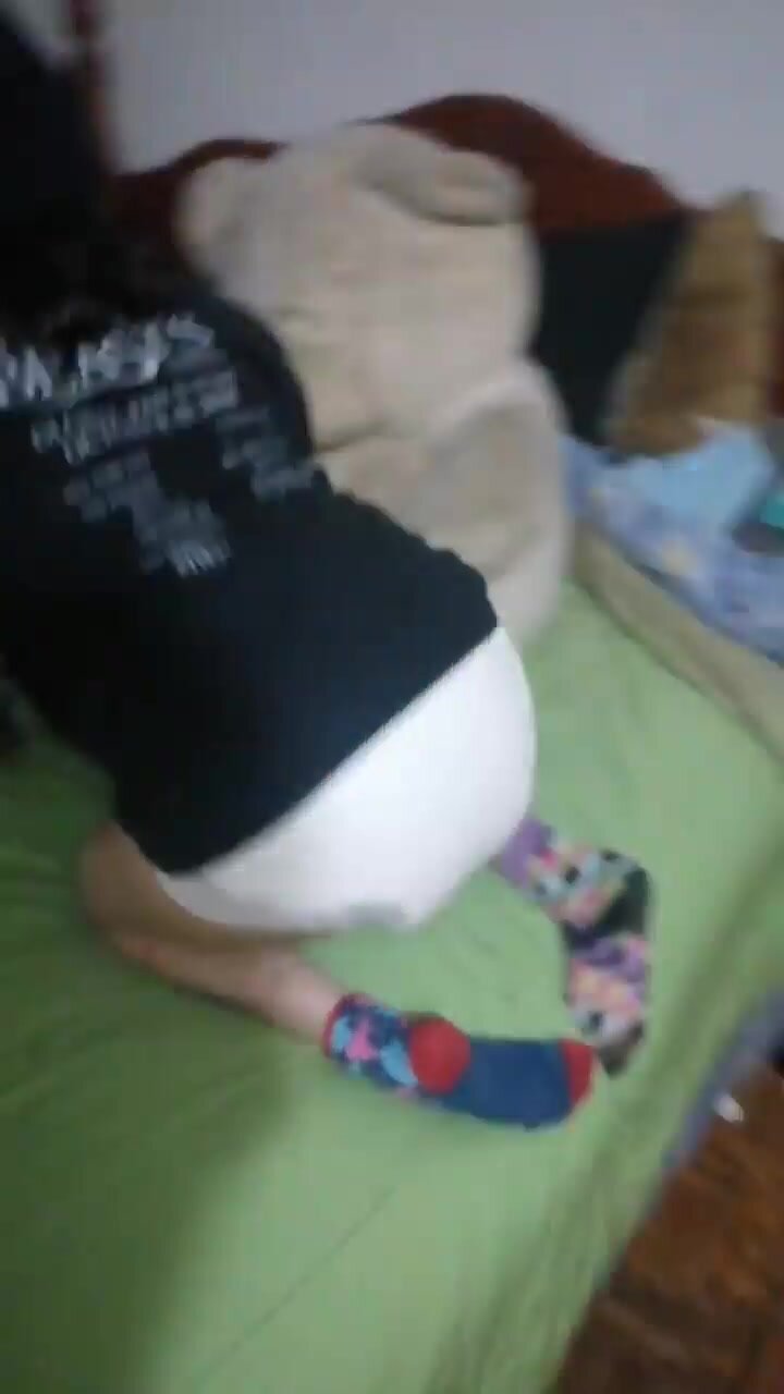 Checking her dirty diaper - ThisVid.com