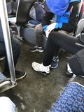 Candid feet on bus