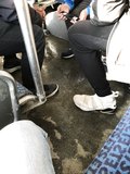 Candid feet on bus