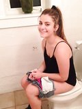 Beautiful girls on toilet