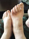 Just comparing our feet. Me size 9 and hubby size 11