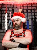Leather Daddy Bear in Christmas attire