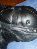 In a leather bodybag - album 5