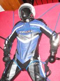 Leather bikerslave is in the Frame