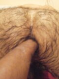 Fisting a very hairy arse