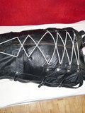 In a leather bodybag - album 7