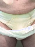 Pee stained panty under wet diaper