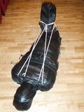 In a leather bodybag - album 11