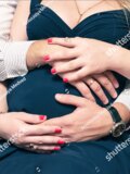 Guys Hands on Belly
