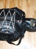 In a leather bodybag - album 14
