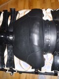 Segufixed in a neoprene bondage suit