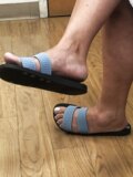 MILF sandaled feet exposed at walk-in