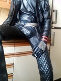 horny in padded pants and leather hoodie