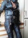 horny in padded pants and padded leather jacket