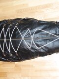 In a leather bodybag - album 15