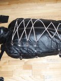 In a leather bodybag - album 15