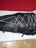 In a leather bodybag - album 16