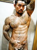 muscle handicapped Thai tattoo