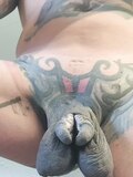 green tattooed split cock with many modifications