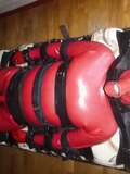 Restrained in a red rubbersuit - album 2