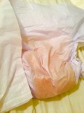 Strange orange color pee in my Attends diaper