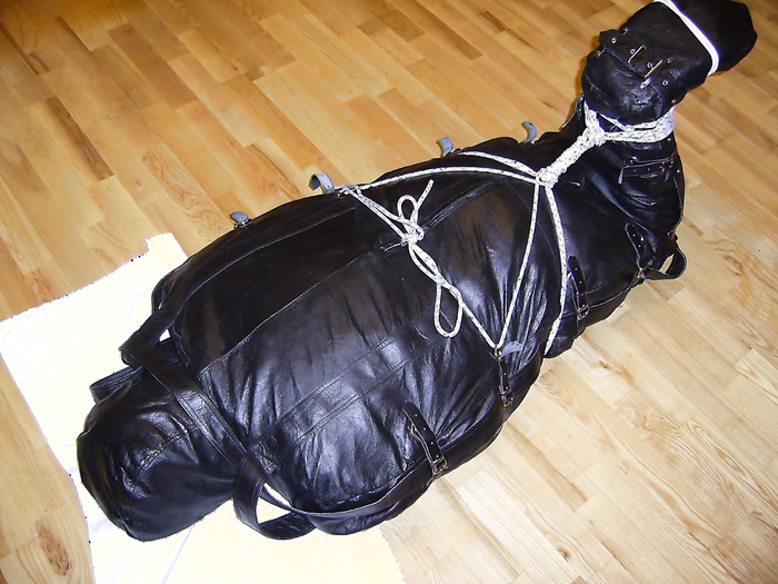 In a leather bodybag
