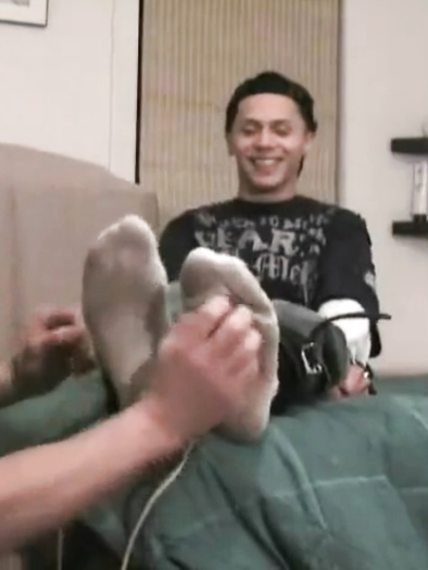 Guys tickled in socks