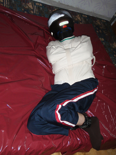 In a canvas straitjacket