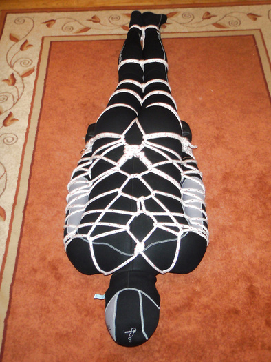 Bondage in a neoprene diver suit