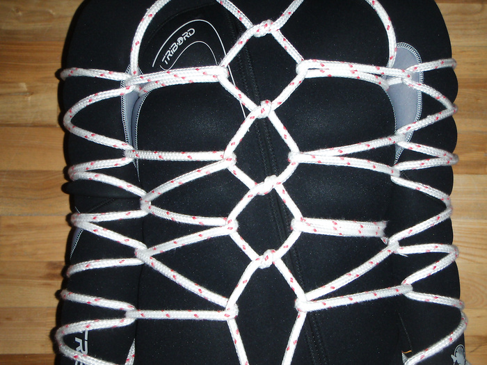 Bondage in a neoprene diver suit