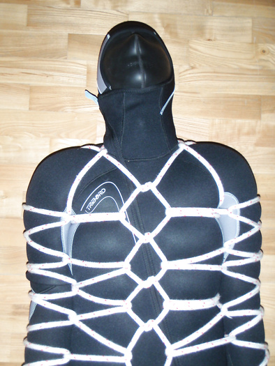 Bondage in a neoprene diver suit