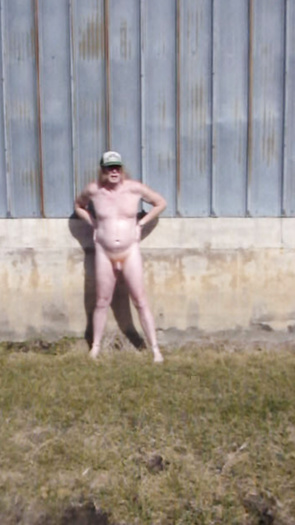 naked outside a feed store, unknown year